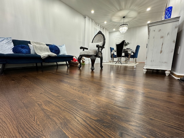 interior space featuring a chandelier and dark hardwood / wood-style floors