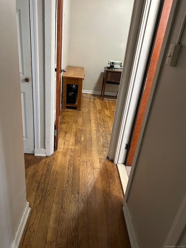 260 Success Ave Unit 21, Bridgeport, CT 06610 - hallway featuring light wood finished floors