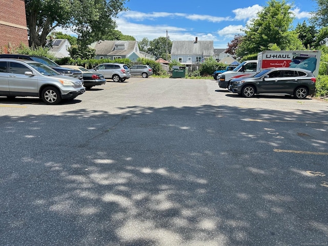 260 Success Ave Unit 21, Bridgeport, CT 06610 - uncovered parking lot with a residential view