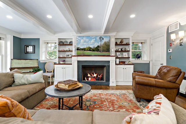 living room featuring light hardwood / wood-style floors and crown molding