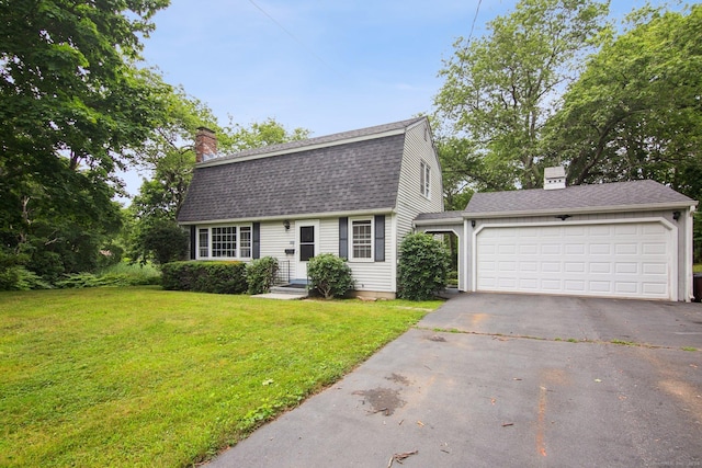 view of front of house featuring a garage and a front yard