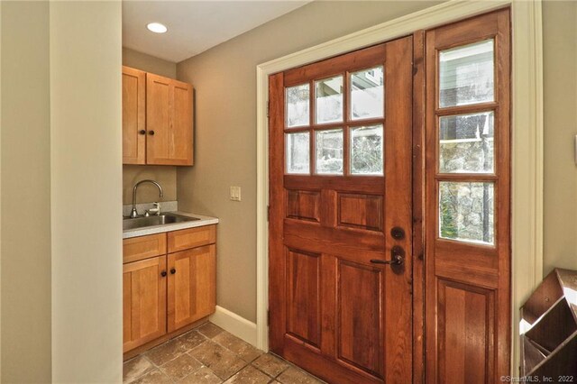 interior space with sink and tile patterned floors