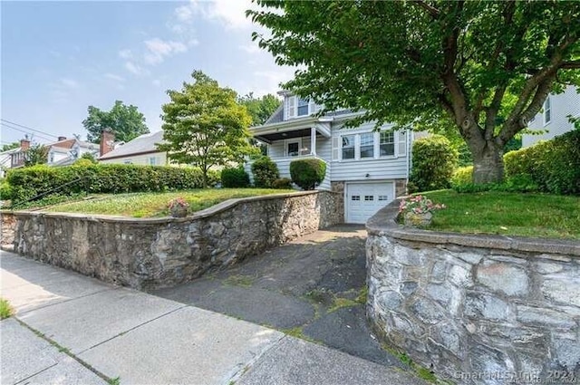 72 Maher Rd, Stamford, CT 06902 - view of front facade featuring a garage