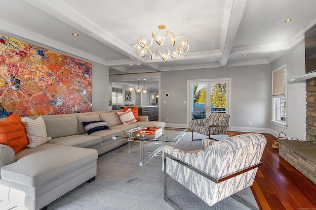 living area with coffered ceiling, wood finished floors, a notable chandelier, and beamed ceiling