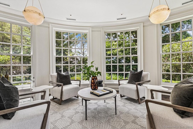 sunroom featuring a healthy amount of sunlight