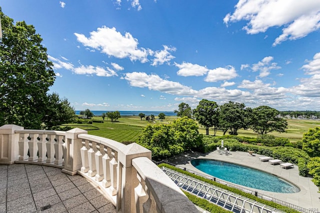 view of pool featuring a water view