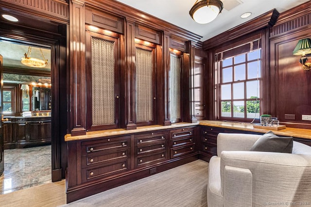 office area with wood walls