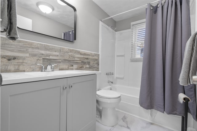 full bathroom with vanity, toilet, and shower / bath combo with shower curtain