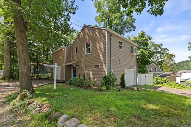 262 Great Plain Rd Unit 13, Danbury, CT 06810 - view of front of home featuring gravel driveway and an attached garage