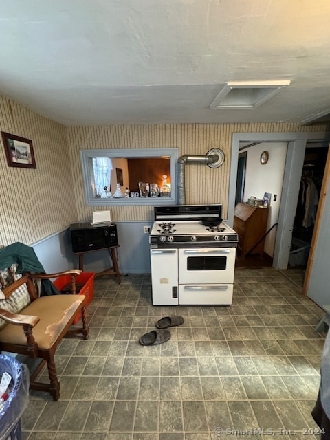 kitchen with tile patterned floors and double oven range