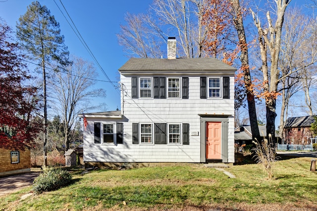 view of front facade with a front yard