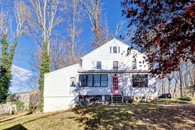 view of front of house with a front lawn