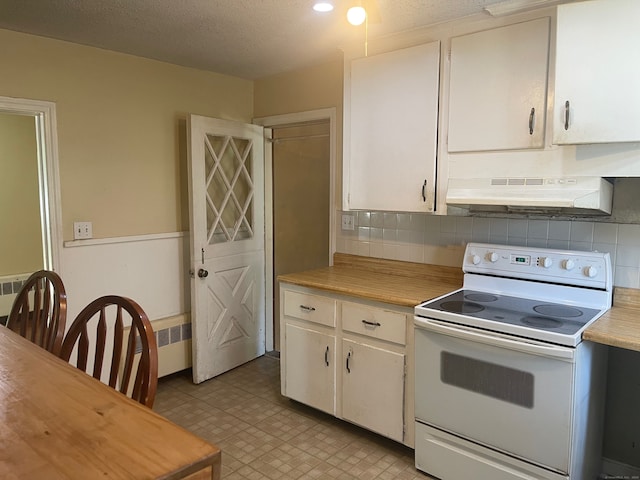 kitchen featuring white range with electric cooktop, backsplash, wall chimney range hood, white cabinets, and radiator