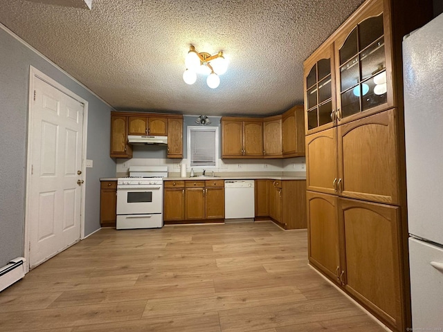 kitchen with sink, baseboard heating, light hardwood / wood-style floors, a textured ceiling, and white appliances