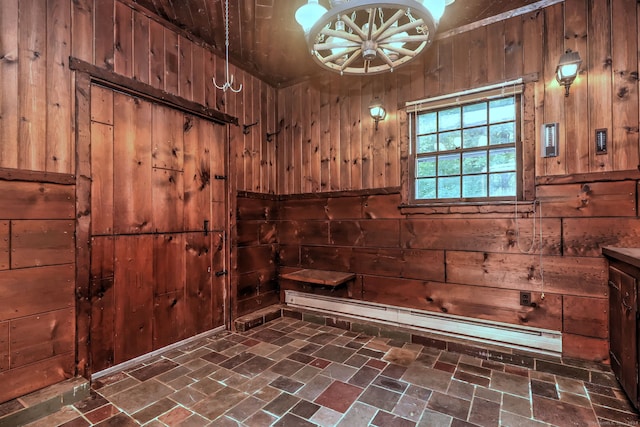 bathroom with wood walls