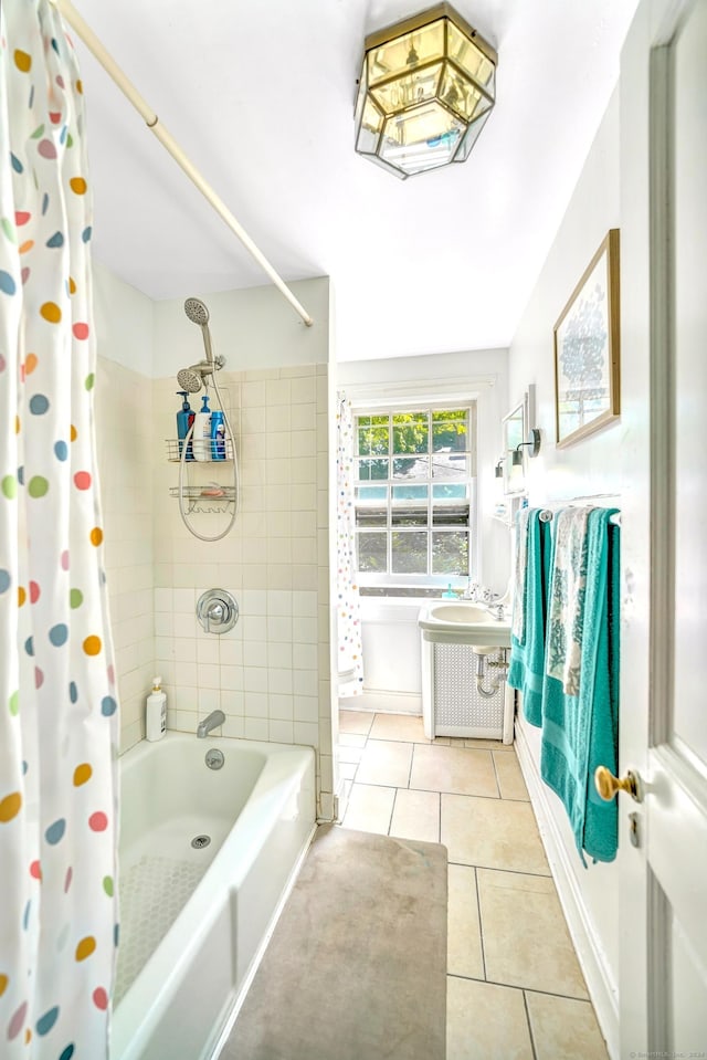 bathroom featuring tile patterned floors and shower / bathtub combination with curtain