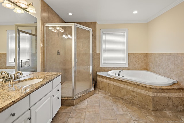 bathroom featuring independent shower and bath, crown molding, vanity, and tile patterned floors