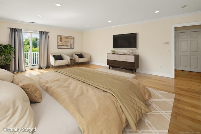 bedroom featuring access to exterior, ornamental molding, and light hardwood / wood-style floors