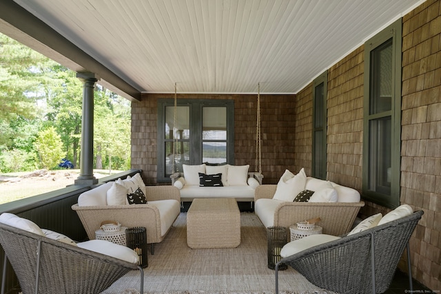 view of patio featuring a porch