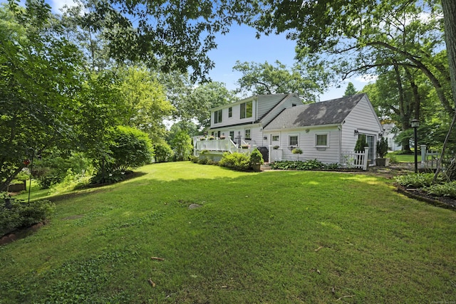 view of yard with a deck