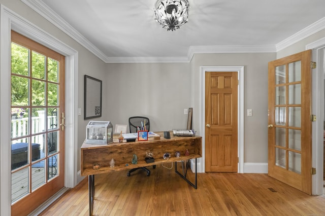 office featuring crown molding and light wood-type flooring