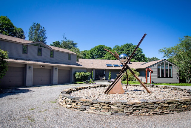 front of property featuring a garage