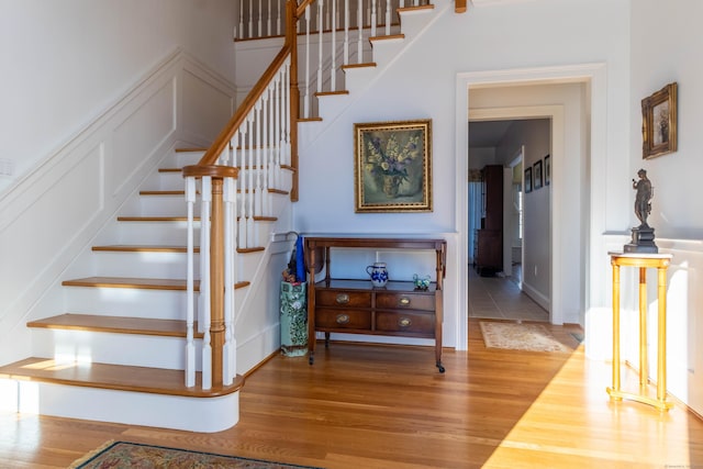 stairway with wood-type flooring