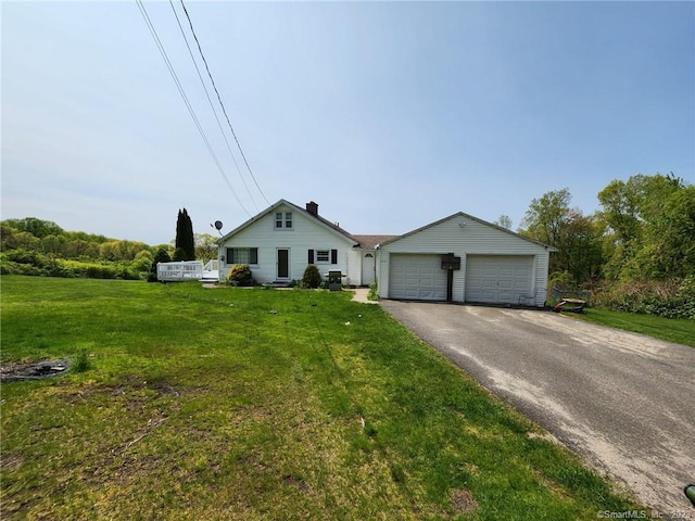 single story home with a front yard