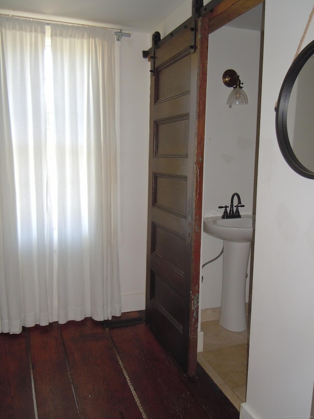 bathroom featuring hardwood / wood-style flooring and sink