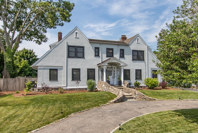 view of front of house with a front yard