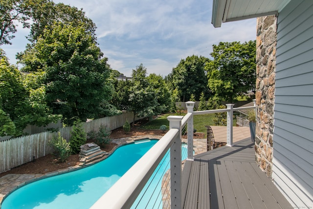 view of pool with a deck