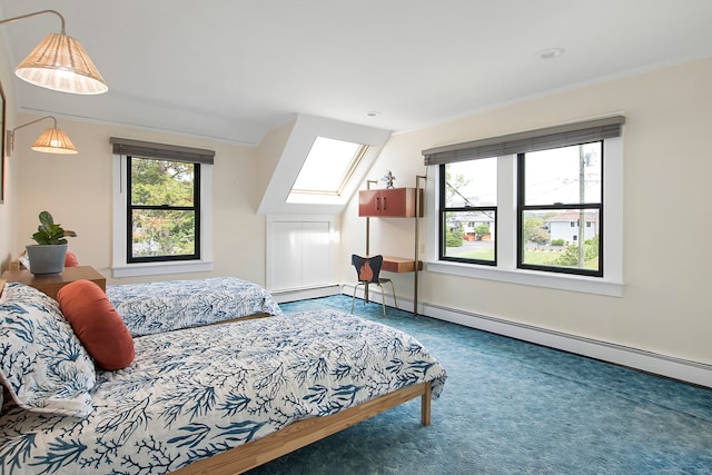 carpeted bedroom featuring multiple windows, a baseboard heating unit, and a skylight