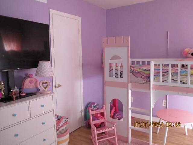 bedroom featuring light wood-type flooring