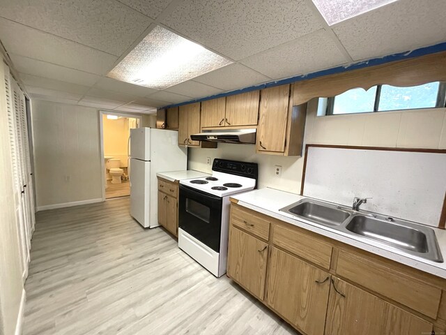 kitchen with sink, light hardwood / wood-style flooring, white refrigerator, electric stove, and a drop ceiling