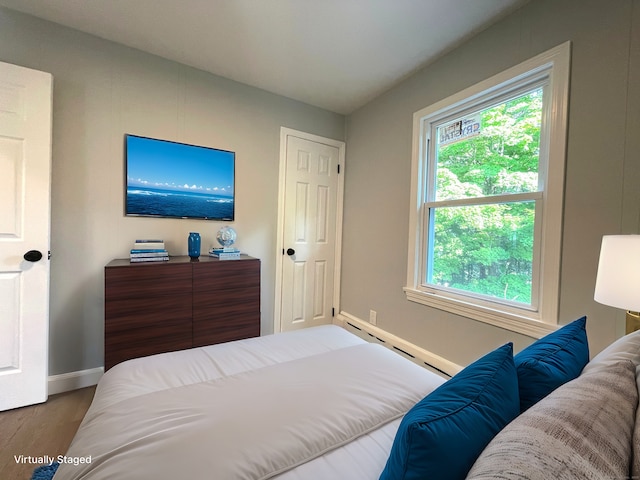 bedroom featuring hardwood / wood-style floors