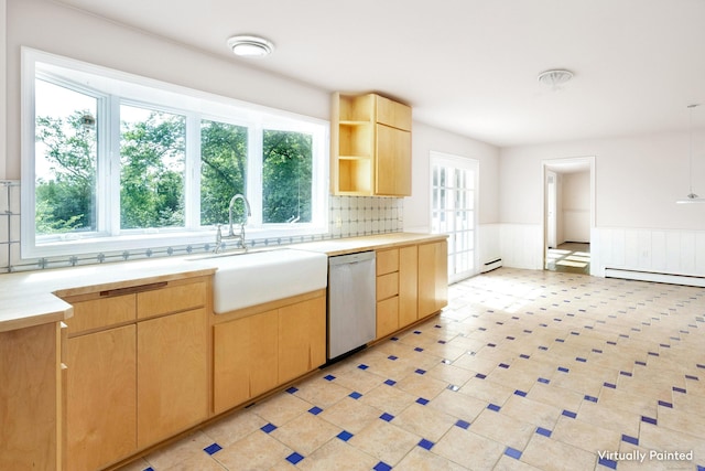 kitchen featuring dishwasher, sink, light brown cabinets, and a baseboard heating unit