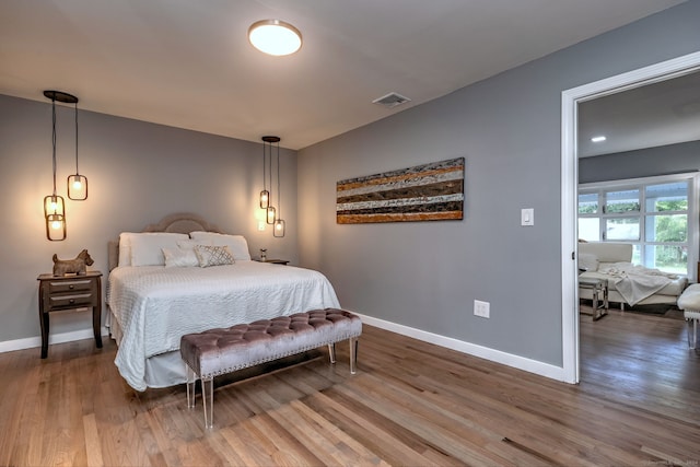 bedroom featuring hardwood / wood-style flooring