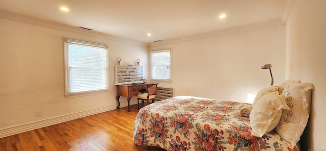 bedroom with recessed lighting, baseboards, ornamental molding, and light wood finished floors