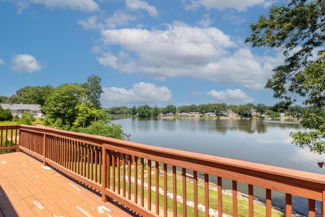 wooden terrace with a water view