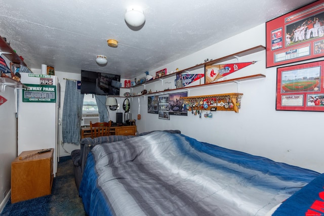 bedroom featuring dark carpet