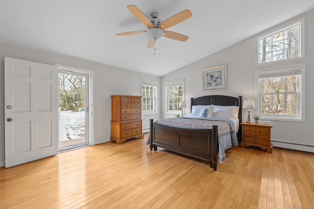 bedroom featuring light hardwood / wood-style flooring, access to exterior, a baseboard radiator, and vaulted ceiling