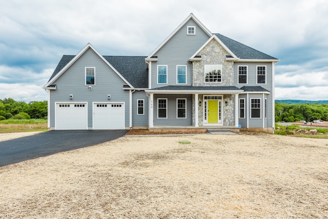 view of front of property featuring a garage