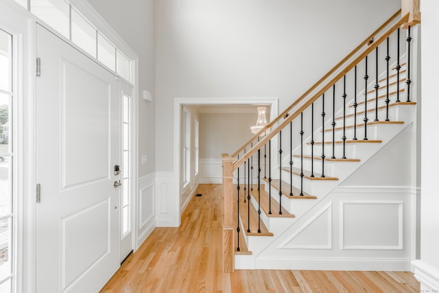 foyer with light hardwood / wood-style floors