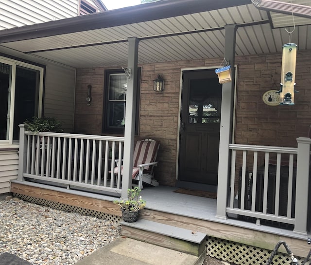 property entrance with a porch