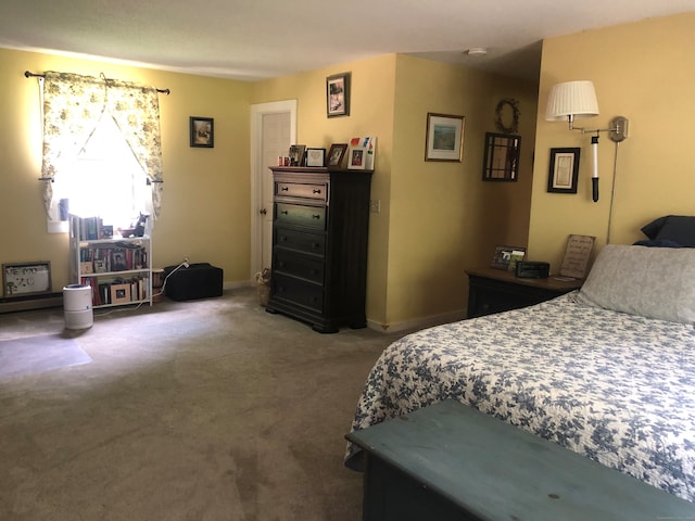 bedroom featuring dark carpet