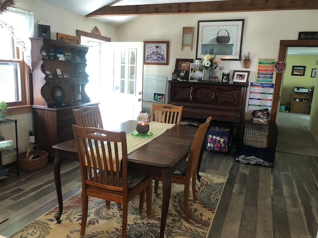 dining space with wood-type flooring