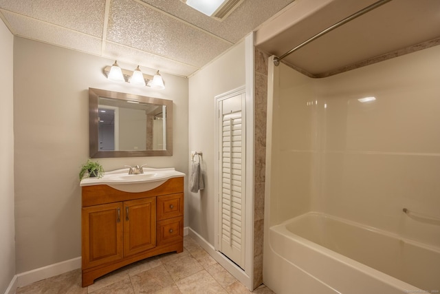 bathroom with vanity and shower / washtub combination