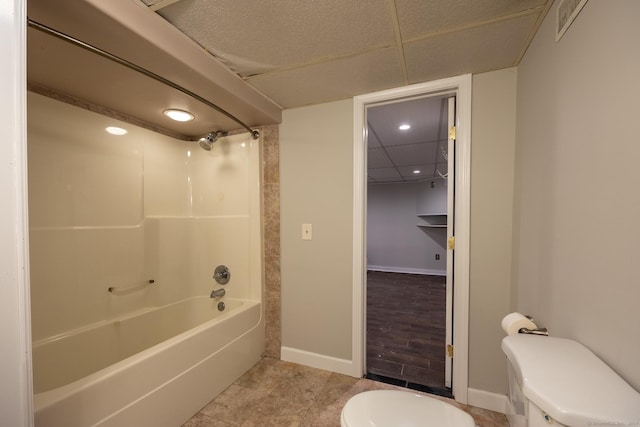 bathroom featuring toilet and shower / bathing tub combination