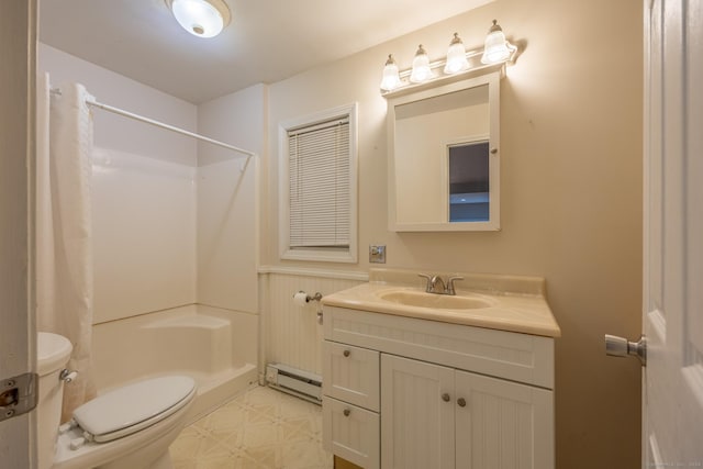 bathroom with a shower, a baseboard heating unit, vanity, and toilet