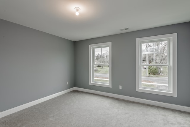 view of carpeted spare room